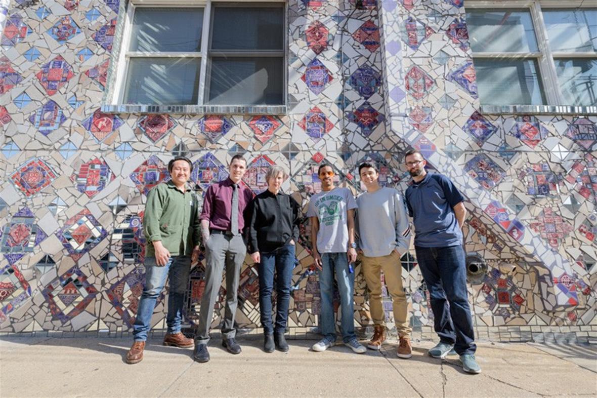 Gathered across Shipley Street from the Creative Vision Factory are (from left) David Kim, Joshua Stout, Anne Bowler, Geraldo Gonzalez, Dillon DiGuglielmo and Michael Kalmbach