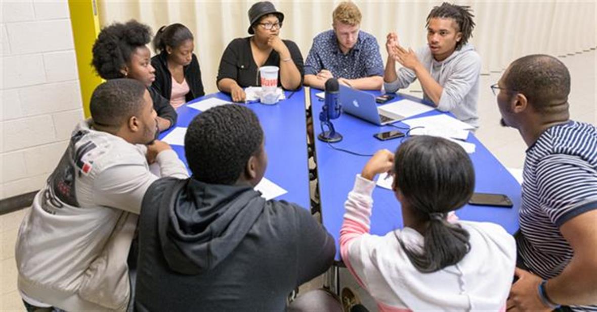 In this photo, a team of University of Delaware Summer Scholars meets with teens from Wilmington, Delaware, to learn about their concerns and ideas. UD students on this team include Samantha Gibbs, Liam Stewart, Christian Wills and Adolphus Fletcher.